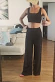 I have nothing bad to say, It fits me just perfectly. Super comfortable set. It is elegant but modern. The pant is really high-rise. The top fit my upper body just fine. I think it is a MUST-HAVE item. Versatile enough for a night party or an evening cocktail. Recommended 100% - Analia O.