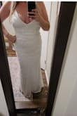 This was one of two dresses I ordered from Lulus for a vow renewal in Santorini. This one was a tad longer and much more elegant than the first (it had a beige underlay with a slit). It's definitely form-fitting and hugs curves. I'd like to tighten my stomach a bit before wearing this, but overall we are very impressed! The sequins is beautiful and the pattern is quite flattering. I normally wear a size Large or 12 in American Eagle. - Kerri M.