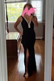 Needed a dress last minute for a gala event. I saw this one and fell in love with it. My husband loved it too. I decided to stitch the plunging neckline up a bit as well as the high leg slit (I am 50 after all). My daughter plans on using this dress for her next dress-up event but wants me to take the stitching out as she likes the high leg slit. As is always the case when you're 5'2, I had to take a lot off the bottom, but that's no biggie. The weight and stretch of the fabric are great. Can't go wrong with this dress, especially for the price. - Kerri S.