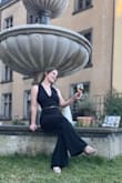 I am in love with this jumpsuit. Jumpsuits are my favorite thing to wear, and this one is my favorite jumpsuit I've ever worn. I wore it to a wedding in Germany and added a gold belt to accentuate the waist. - Grace W.