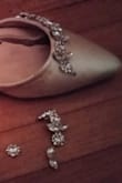 I loved these shoes when they arrived - they were beautiful, comfortable! And went with my outfit perfectly. However, about 2 hours in to wearing them, the rhinestones half fell off of one shoe. This was at my brother's wedding and I was preparing to walk down the aisle so not good timing. Thankfully someone at the venue had glue and saved me. But an hour later, the rhinestones on the *other* shoe half fell off! This was now before dancing and the guy with the glue was gone so I just had to rip the half off, otherwise it was just flopping around. I was bummed. I suppose this is what happens when you buy inexpensive shoes - but hello, they should survive the very first wear!! They also got scuffed right away but they are light and the material is soft so not tragic but not wonderful. - Rebekah M.