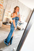 I love this dress! I wore it for my cousin's black-tie wedding and it was a hit. I got so many compliments. The length is long, but nothing some heels couldn't fix. I also got the slit to go further down. It separated at my hip and was too much to dance with if not. Also keep in mind, you could adjust the straps to be on your shoulders. - Brittany L.