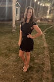 This dress is classy and alluring. I loved wearing this dress and got many compliments. It fit my chest and waist well without being too tight. The color was a beautiful deep blue (it was dark on the attached photo but not that dark in person) - Ashley H.
