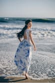 I purchased this dress for my engagement photos at the beach.  Fit was perfect, just needed a hem since the dress was too long for me. - Tori C.