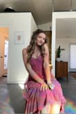 I love this dress -- it's very princess-y and whimsical.  It does not have any stretch so if you're wider/muscular up top, it might be tough to get the zipper up and I'd maybe size up. - Alexandria B.