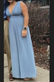 I wore this for my birthday dinner last month and could not be more pleased. The material is flowy and light, yet still durable and feels of high quality. I had to get the shoulders taken in a little, along with the actual pant length since I'm so petite but after alterations, it was perfect. - Jean C.