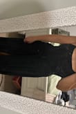 Extremely high slit I am on the fence about returning it and it is very very long. I will need to make alterations to this dress if I keep it. - Lilian H.