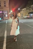 I bought this dress for my 50th birthday (together with the shoes and purse), and I absolutely love it!! I was surprised at how soft the material was and the high quality. It's well-made and looks exactly like the pictures. I'm a tall Dutch lady with a slim waist and tall upper body which sometimes causes a bit of a struggle (it keeps moving up) with waistbands like these. If that's a huge issue for you then I'd suggest ordering a Large (I think an L would have worked just as well). This dress is a medium, I always wear 8 or 10 dresses, and this one fits like a charm!
Can't wait to wear it again. - Carol R.