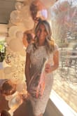 This dress was absolutely perfect for my bridal shower. I was initially nervous it wouldn't be too flattering around my waist line but I was wrong! It is very flattering and elegant. I can't wait to wear it again. - Meghan B.