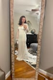 The lace on this was very fine and delicate. The dress ran large, so it wasn't doing me any favors. I felt like the long train was not me, or the brick a brac on the neckline - felt too 60s. Very unstructured. Went with a different Lulus dress instead of trying a new size. - Marlane B.