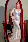 Quality is great. The lace is soft. It's a bit snug but I'm hoping to drop a few pounds before my vow renewal. - Joy K.