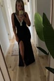 This is the most stunning special occasion dress I've ever purchased. Worth every penny. Wore to a friend's fall wedding and received a ton of compliments. Just the right amount of sass and class! - Jamie H.