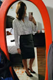 Wore this skirt to work, very cute! I could also see wearing this out as well, very versatile skirt, good length and material. It is not stretchy, but it fits true to size. - Kelsey L.