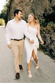 This dress was perfect for my engagement photos! It fit perfectly and definitely showed off my curves without being too tight in the wrong places. The material feels high quality and is not see through like most white dresses are. Highly recommend! - Meghan R.