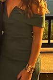 The dress was beautiful in every way the fit, the color, and the comfort. I wore it for a wedding and was pleased with how I was comfortable the entire day. The green color was perfect for fall. I ordered a medium and it fight great! - Gabriella G.