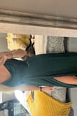 Being tall I was dreading that it would be too short but it's actually a little long and will allow me to wear heels with it. The quality of the material was way better than I expected and has a liner so it's not super thin or clingy. I ordered a medium and it Runs a little large but I wouldn't change my size order. The shipping and duty costs are a bit ridiculous, but at least the dress was on sale. - Rachel V.