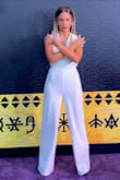 I wore this jumpsuit to the Wakanda Forever premiere and fit right in - it's simple and stunning. I got so many compliments! The back looked great, too! Of course, it was long because I'm 5'2 but this worked out perfectly with some 4-inch heels haha. - Courtney M.