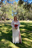 I really loved this dress! I normally would get a 2X but I didn't want it to be loose so I went with a 1X and it was perfect! So many people gave me compliments on this dress. I ordered it to get here in 2 days and it arrived just as I expected. I'm so happy I found Lulus and this dress! (The slit is a little high, if I had time- I might have seen about sewing it closed a little at the top, but it wasn't a deal breaker!) - Jeri R.