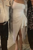 This material is stretchable and flattering!!!! I just had a baby three months ago and needed a wedding dress soon after. I was shocked to see that the first two dresses did not fit until I got to this one. I did have to change the zipper. Yet fit, the price and material allows me to say it's perfect! - Lisa J.