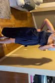 Dress fits perfectly, it does have a zipper on the side so makes it easier to put on. I did wear this dress without a bra so it wouldn't have to feel so tight. - Amy C.