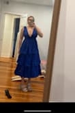 Wasn't the vibe I was going for. Very bright color. Scared the tiddies would pop out if I moved and has a bow you tie in the back that made it look a little childish - Annie O.