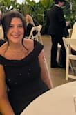 This dress is gorgeous and the perfect long, black dress for any wedding. The material is stretchy so it fits super well, and is made of good material.  I had to have the bottom hemmed a bit but other than that it was perfect! I wish I had taken more pictures to attach. - Hannah S.