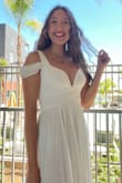 I used this dress for an engagement photo shoot by the beach and the photos came out whimsical and dreamy. Dress fits tight to the body but that's how it's supposed to be. Worth it! - Ashley P.