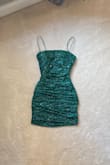 So I ordered a bunch of dresses from Lulus for my homecoming. This one was, by far, my favorite. It arrived early and was perfectly intact. The dress flattered me in all the right places and wasn't too short. If you would rather it be a safe length, rather than tight, size up. The dress's sparkles were significant, but not too big, it definitely wasn't glitter fabric like other dresses on this site. Personally, I loved this feature, because I sparkled when light hit the dress! Bonus, the sparkles didn't flake off or shed. It does have the butt-ruching, but if you get the dress in darker colors, you can't even tell. I really loved this dress and you should definitely get it <3 - Harper D.