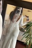 I purchased this dress with a few others. The second I put this on I knew it was the one. It fits perfectly. It flattering, thick-quality material. Perfect for my winter wedding. I'm adding a vale to dress it yp. LOVE this dress - Amanda S.