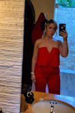 I had not one,  not two,  but three people come up to me during a wedding rehearsal dinner to tell me how good I looked in this jumpsuit! One woman said I was "stunning" and another said "incredible" Both of these people were strangers and came up to me just to say something.  My only complaint is I ordered a large which is what I wear in pants normally, but the top was loose on me since I'm a medium :(  ( where my pear-shaped girls at? ) I did feel like I was pulling it up often but otherwise, it's a flattering cut and looks great in photos. Also definitely cut the hanger strings off.  They pop out easily. - Emily W.