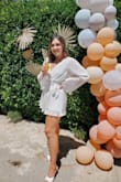 I had two bridal showers and wore a dress to one and this romper to the other, I wanted it to be a different look. The pleats made it feel more elegant than just your regular romper. It was super comfy and flattering and I loved wearing it all day! I paired it with the cutest shoes (from Lulus too - Muskaa White Pearl Square Toe High Heel Sandals) and got a ton of compliments on the whole outfit. - Allie A.