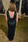 Wow, this dress was gorgeous. I felt like the best dressed guest at a recent black tie wedding. It's stretchy and form fitting, so it gives a beautiful silhouette. I'm actually a 34G cup, so this one stretched enough to fit my bust and also wear a strapless bra. The back drapes and is so dainty.
The dress, though, is very long. I bought 5" heels with platform toes and it was still about an inch too long. Buy it early enough to get hemmed! - Stephanie S.
