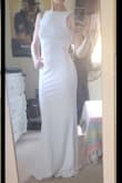 After having purchased a completely different dress, from Lulu's, I took the recommendation to try this style. I'm so glad I did because this was The One and everytime I put it on I fall in love again. The material it think and "strong" with just enough elastic to be comfortable and not too tight. I'm so excited for the big day, when I ge to see my grooms face when he sees me in this! - Heather B.