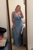 I was weary of ordering this one because I wasn't a huge fan of the front in picture reviews but I needed a blue dress for the "something blue crew" that I am in for my cousin's wedding. I ordered it along w two others, and the front of this one is just so plain. It fit just fine though, the back straps were a little snugger than I liked but I could've made it work if I needed to. Also a tad bit long with 3in heels, but I'm short so I'm used to dealing with that. - Erica B.