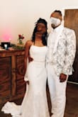 This dress was PERFECTION! I'm short and slim so the only alterations I had to get done was for length. I received so many compliments. I'd recommend this dress a million times to slim women my size. Hopefully, these photos can help you decide. Sorry for the blurred faces - Lyn H.