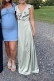 I wore this in my brother-in-law's wedding. It was long for me and had to be hemmed, but that is to be expected if I wasn't wearing heels. SO flattering. I am obsessed with this dress. - Gabrielle A.