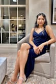 This dress is amazing, it fit me well, just the strips are a little bit loose and I have to tighten them up. The fabric is stretchy, nice style around the waist to make it look smaller. - Quynh D.