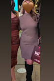 This dress is perfect for the fall/winter season and can be worn for any dinner date or holiday gathering. The dress did not ride up at all which can be an issue sometimes depending on the style but not with this sweater dress! I will also say that I sized up to an XL and very glad I did as the XL fit perfect, and still form fitting. For reference I am 57, and 165 lbs and dont think the large size would have been very flattering on me. I did wear shapewear underneath to smooth any visible tummy lumps but will be ordering this dress in another color very soon! - Marcela O.