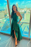 I loved this dress and after reading reviews I definitely sized up. Many of lulus dresses fit snug at the ribs and chest but I actually like it because it holds everything together nicely and a bra is unnecessary. The pockets are great and the cut is flattering. It is off-centered but if you know that, you can work your angles for a photo to show off the leg. The green isn't as bright as the photo shown from lulus (which seems edited) but it is still a gorgeous color. - Lauren M.