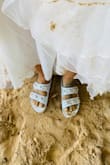 These will be perfect for my beach elopement coming up in November! Something to wear down to the sand and slip back on after. Pretty true to size and adjustable (luckily because they weren't tight enough at first). Cute, beachy, and perfectly me because I loveeee my slides. (Edit to add picture and say they werent as big as they looked I just didnt have them slipped on all the way =B) - Tayla N.