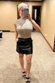 This skirt fits like a glove. Perfect for my small waist. I think it fits true to size but it's fitted for sure. Amazing quality as well. And I love that it has pockets. - Sara Y.
