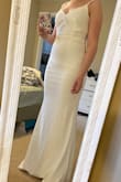Very pretty and nice material. I am very small on top (shoulders and bust) so it didn't fit great on top. I should have ordered smaller. I ended up returning as it wasn't quite what I was looking for - Sarah S.