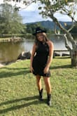 A little bit of stretch and very comfortable.   My daughter wore it to a country themed dance at school.  She loved it!! - Amber M.