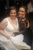 I literally had stalked this dress on Lulus.com for a year! All of the reviews said how great the quality was and customer pictures looked amazing. Because of the black's popularity, as soon as it came back into stock, I made sure to order it. The largest size they had in stock was a medium, and based on the sizing chart, it seemed like the medium would fit me "okay." So I ordered. Turns out the medium fit my top great BUT would not zip up completely at my waist. There is at 2 inches of distance left until I can completely zip up the zipper. Luckily I have an amazing tailor that is going to add a gusset onto the dress and bring it out for me. This will be my bridesmaid dress for my friend's wedding this coming November. Moral of the story: I would definitely size up if you're worried about the sizing... because you can always alter and bring in the fabric or waist if need be.. it can sometimes be a challenge to add more fabric. Overall, great quality lace and beautiful dress!
Update:
I've added photos from this past weekend when I was in my friend's wedding. Dress was a total hit! I got so many compliments and felt absolutely gorgeous in it. Only thing I would probably add when I wear it for a future event, would be to add cups for more support in the front. If you have a larger chest like me, I would consider doing the same. So glad I chose this dress!! - Megan N.