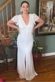 I was skeptical about this dress being the one at first, but as soon as I tried it on it felt different. I came out and showed my mom and my bestie and their faces said it all! I had tried on two different dresses from Lulus but this one felt the most bridal on my body shape. I was in this dress for a good half hour just feeling really great. My wedding is at a small restaurant and has a really romantic feel. This dress makes me feel like a bride.
I'm not sure why the photos uploaded sideways, but I hope they capture how the dress really looks. The weight and material feel really good quality. I love how the open back is still high enough to hide shape-wear.
I really recommend this dress! It's both simple and detailed with the lace. I'm thinking of either adding a skirt attachment or a belt. - Lucianne C.