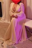 wore this for my bridal shower and it was beautiful! I bought this dress in black first and i loved it so i ordered this for my bridal shower. I noticed it runs smaller than the black dress so i had to wear a cami underneath but it still looked great! i would recommend this dress but i prefer to wear the black dress for a night out. - Anika A.