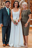 I loved this dress as my wedding dress. It was affordable, but didn't look cheap. I'm not usually a sparkly, princess-y kind of girl, but I loved this sparkly, princess-like dress. I liked its classic look and minimalist style. It fit pretty well, but I did need to get it altered, which cost almost as much as the dress ($140), so I'm glad I didn't spend too much on the dress itself, as we were trying to keep to a modest budget. I wore it all night - for the ceremony, dinner, and hours of dancing. Because it's not form-fitting, no shapewear required! - Molly A.