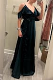 This dress fits great, the only downside is the snap does not stay clipped. No matter though I wouldn't have used it anyways cause I like the way it sits. - Tori W.