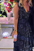 Absolutely loved this dress! It was so comfortable and flattering! I received a ton of compliments on it. I originally ordered a large but it was too big so returned for a medium. The medium was a tad loose but was still a very flattering fit. 10/10 recommend! (Unfortunately I did not get enough photos in the dress to really show off how great it looked.) - Tristin L.