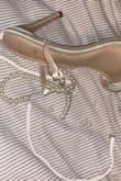 Beautiful shoe but my daughter don't even get to wear them. Pearls broke as she tried them on. - Carmen P.